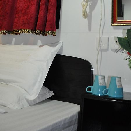 Guangzhou Guest House Tsim Sha Tsui  ภายนอก รูปภาพ